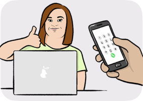 A woman thumbs up in front of her computer, at her side a hand holding a smart-phone